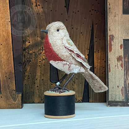 Mini robin on vintage reel