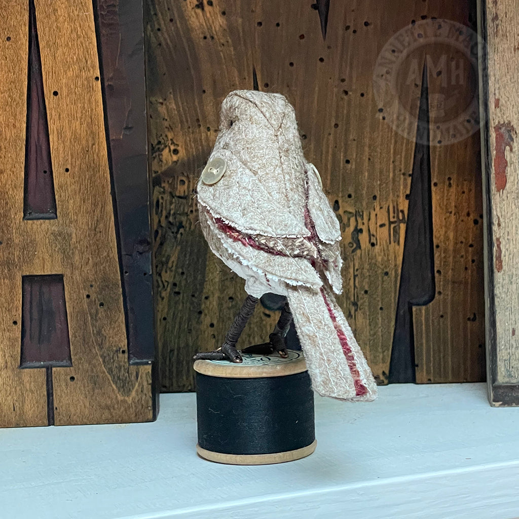 Mini robin on vintage reel