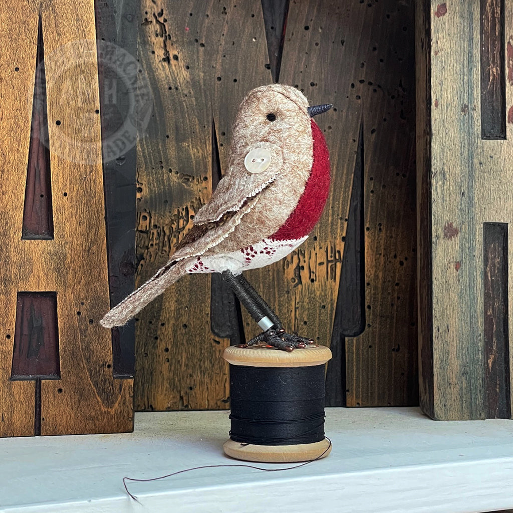 Mini robin on vintage reel