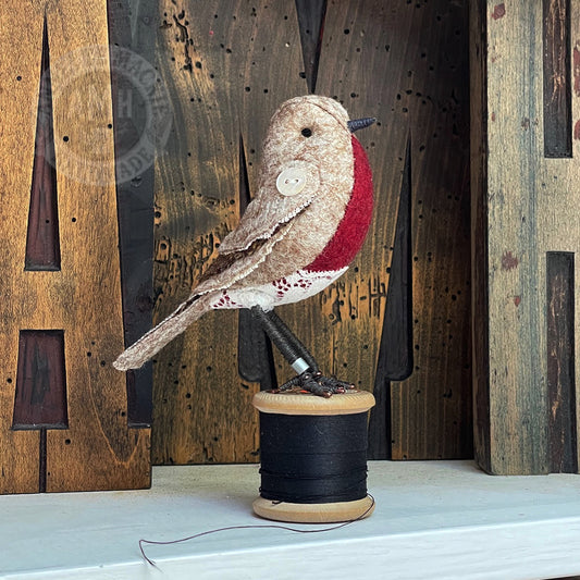 Mini robin on vintage reel
