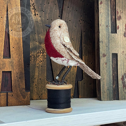 Mini robin on vintage reel
