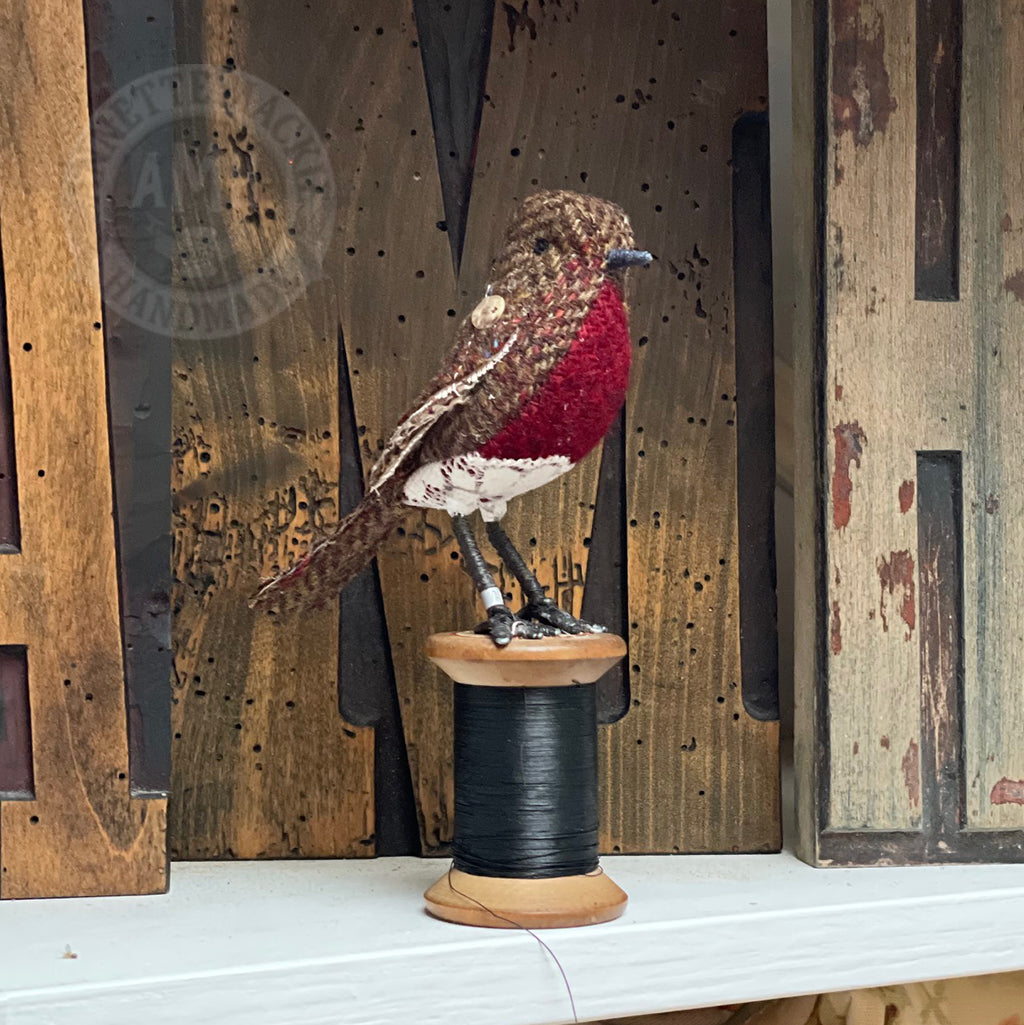 Mini robin on vintage reel