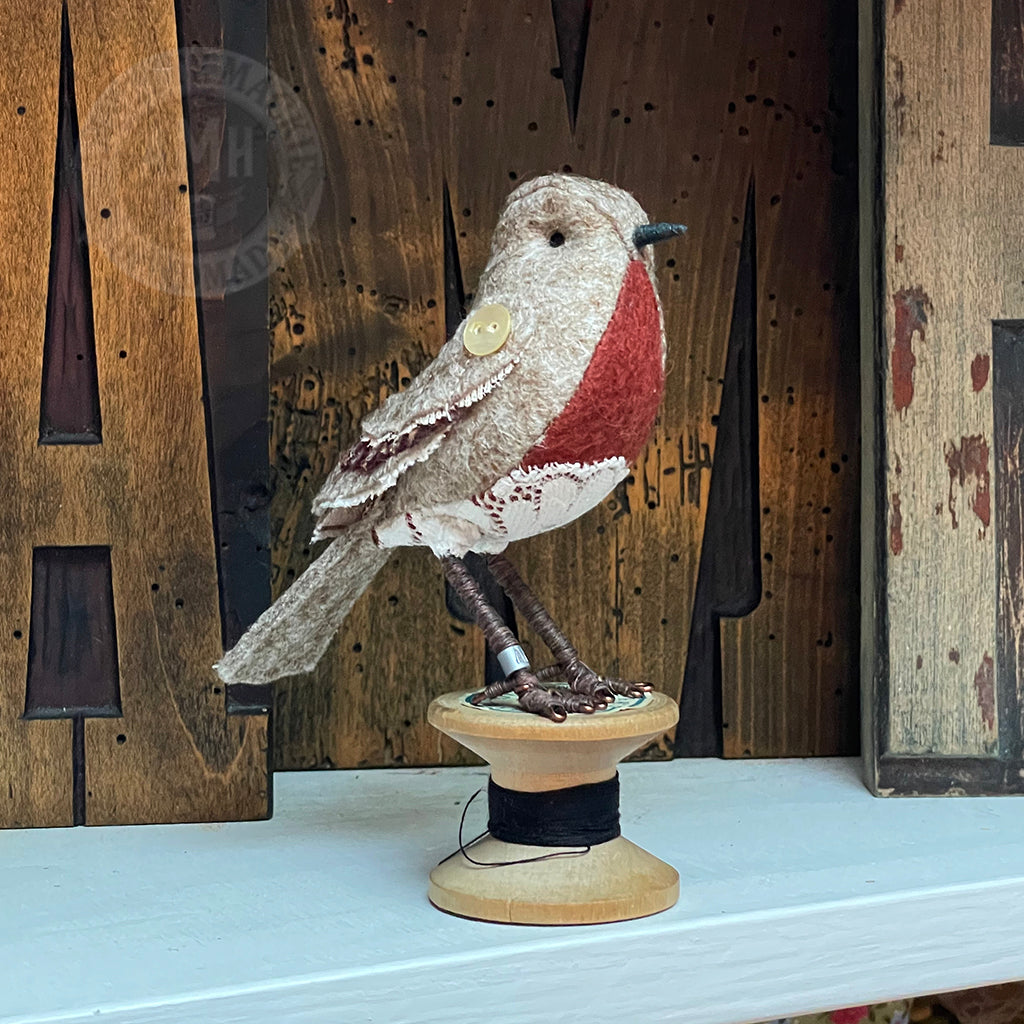 Mini robin on vintage reel