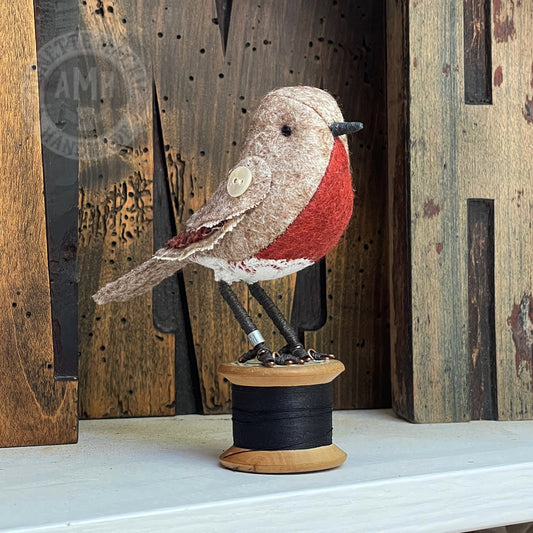 Mini robin on vintage reel