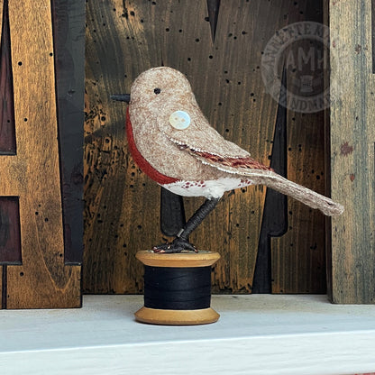 Mini robin on vintage reel