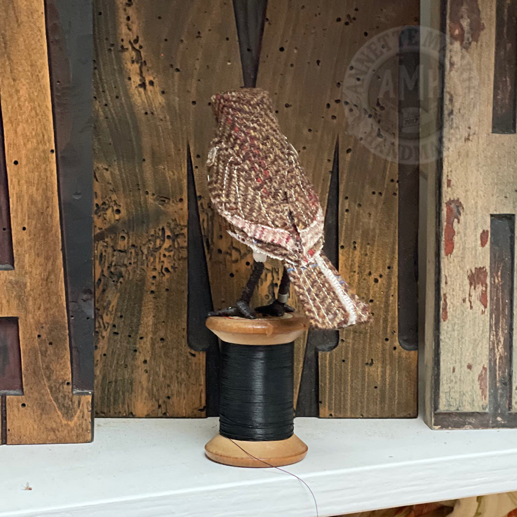 Mini robin on vintage reel