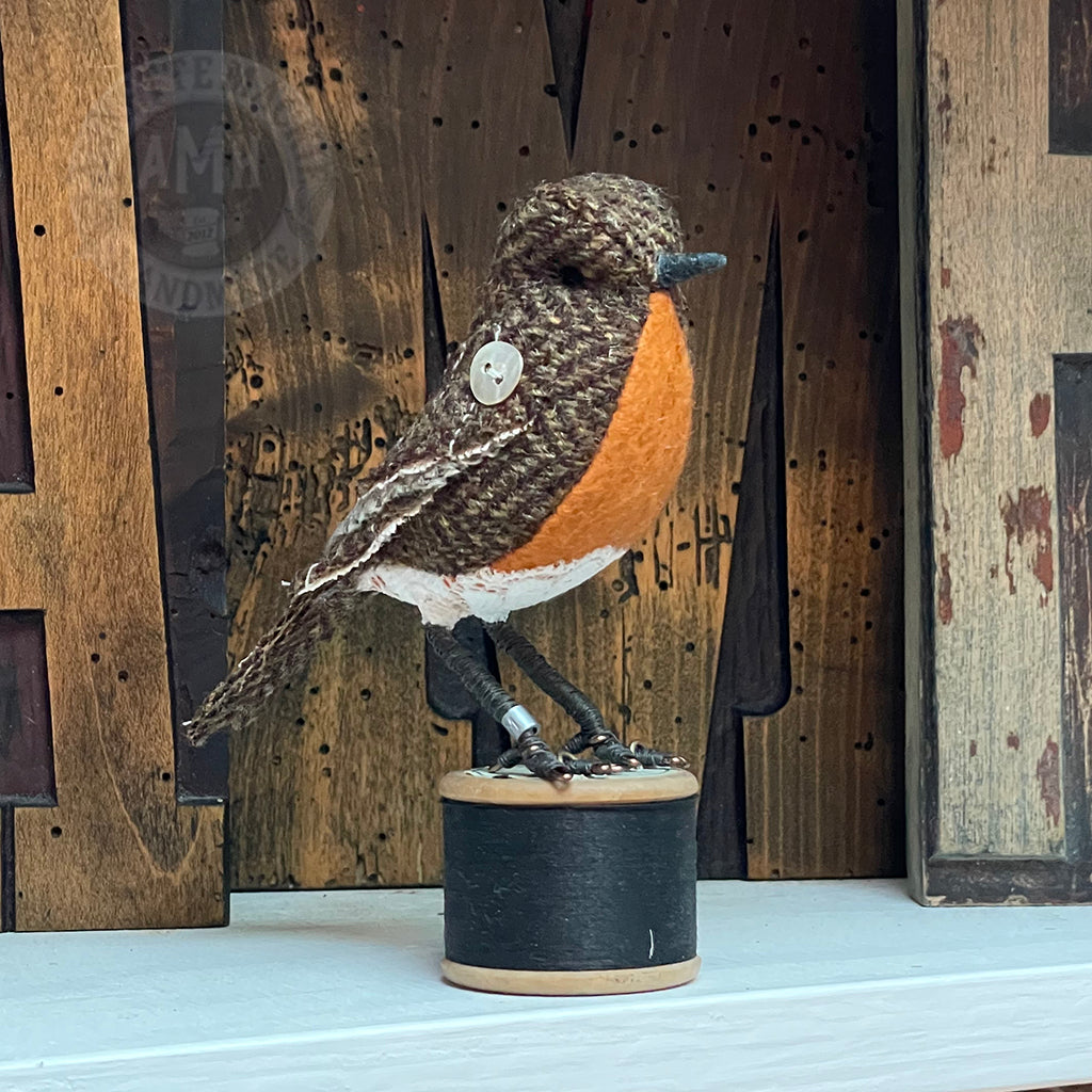 Mini robin on vintage reel