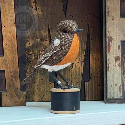 Mini robin on vintage reel