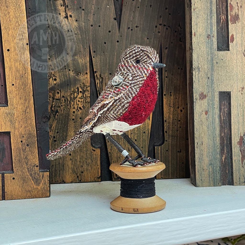 Mini robin on vintage reel