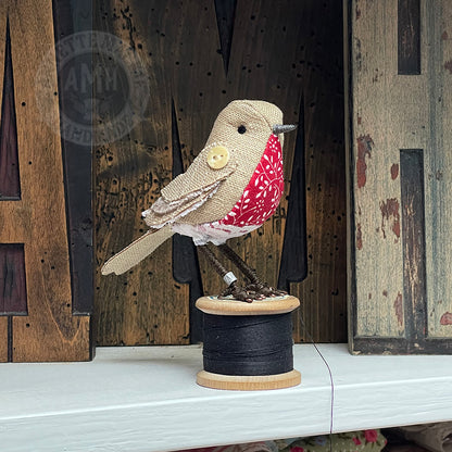 Mini robin on vintage reel