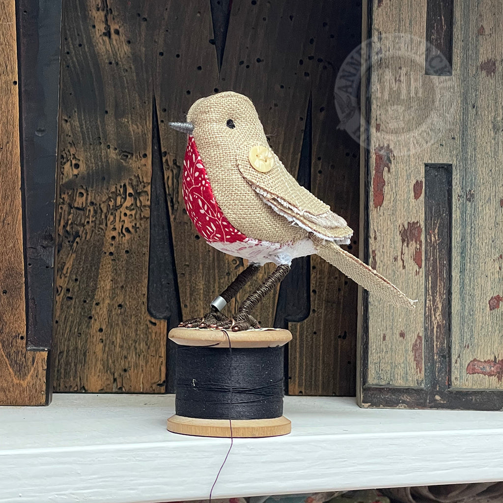 Mini robin on vintage reel