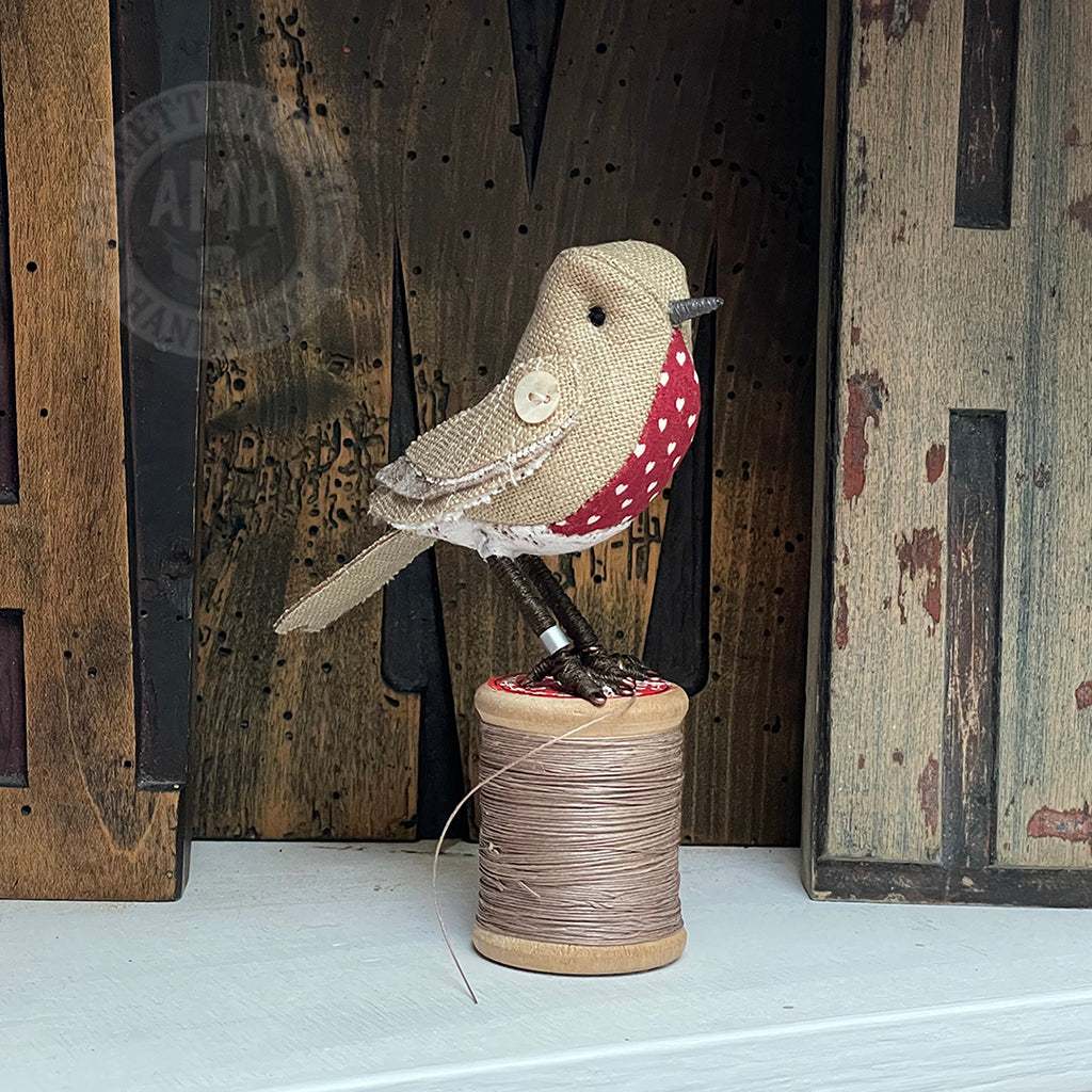 Mini robin on vintage reel