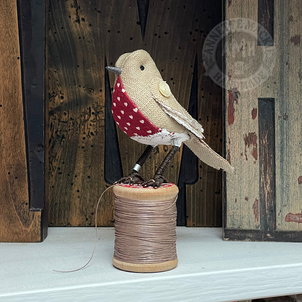 Mini robin on vintage reel